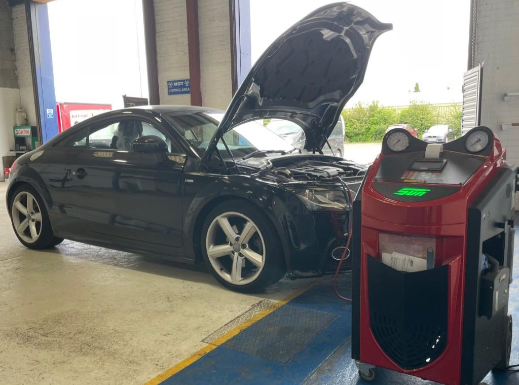 A vehicle having its gas recharged - Car Air Conditioning in Castle Donington